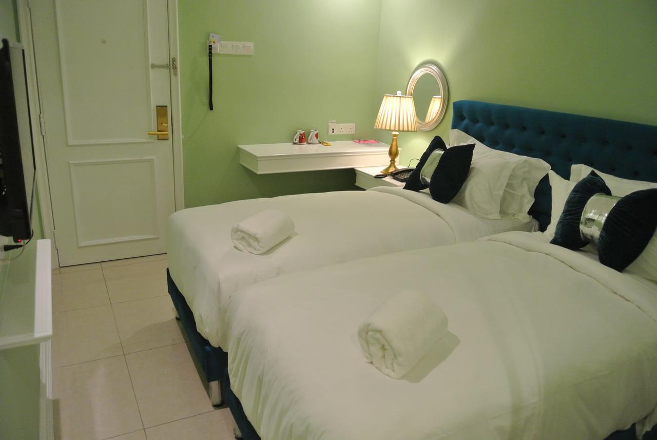 1 Day Car Hotel Station 18 Ipoh Extérieur photo
