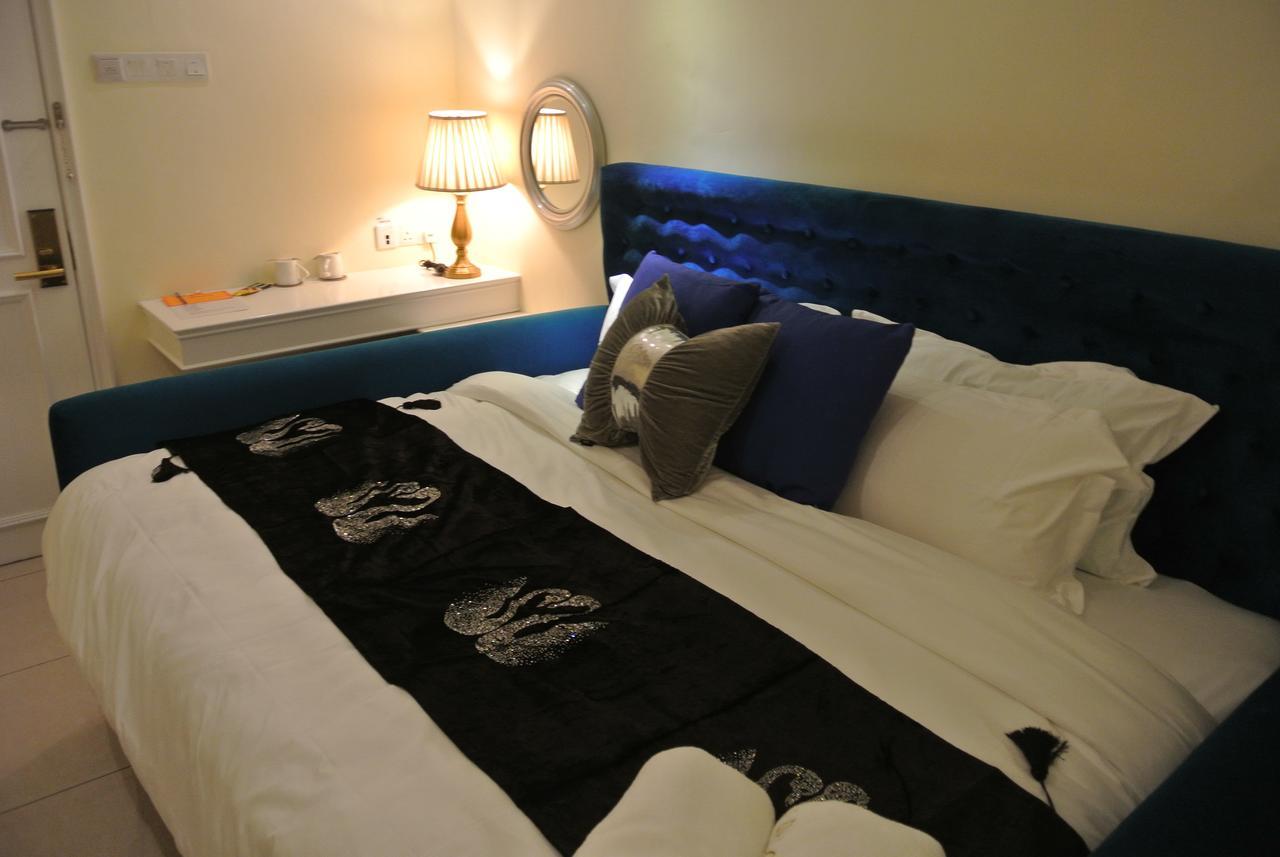1 Day Car Hotel Station 18 Ipoh Extérieur photo