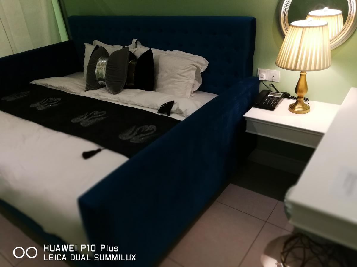 1 Day Car Hotel Station 18 Ipoh Extérieur photo