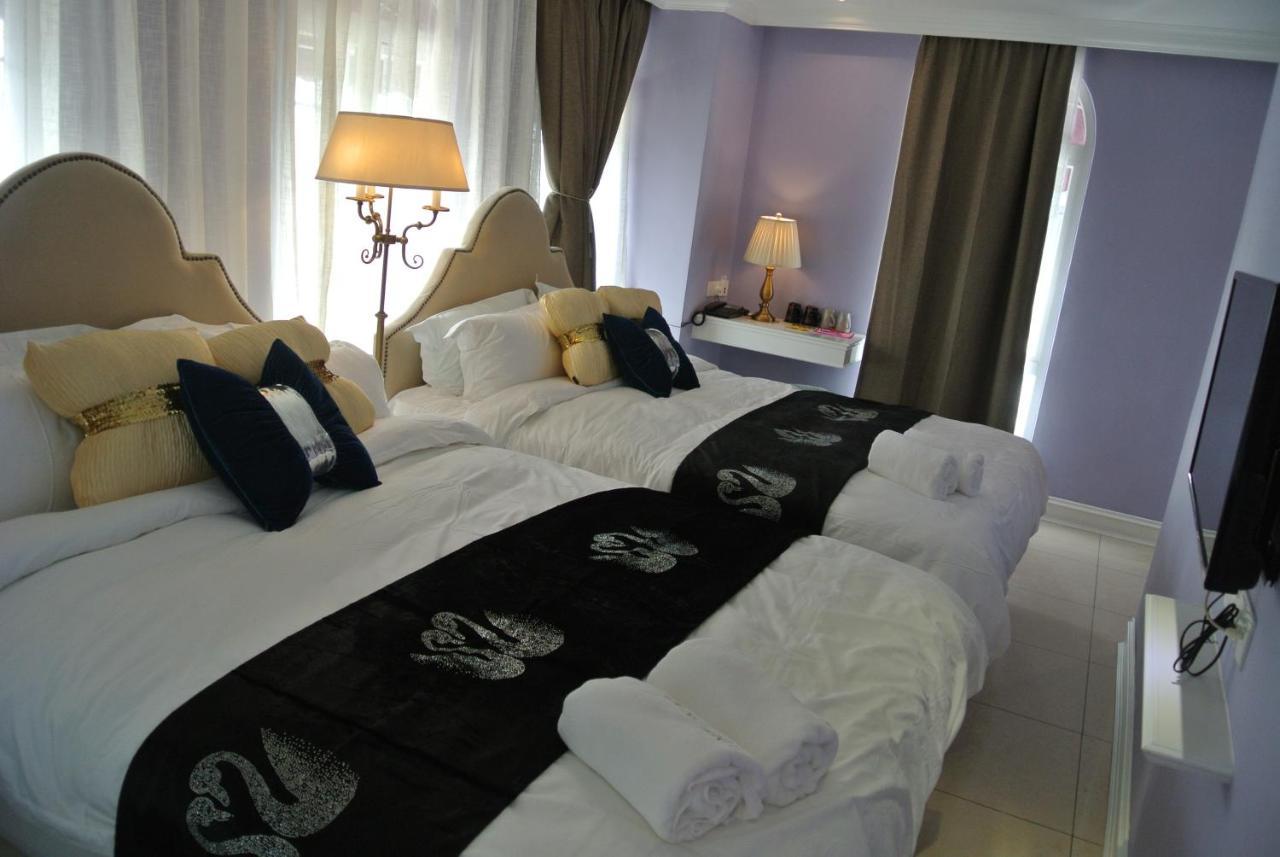 1 Day Car Hotel Station 18 Ipoh Extérieur photo